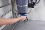 garbage disposal leaking from bottom