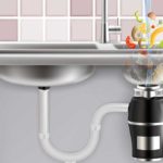 Illustration of a garbage disposal attached to a kitchen sink