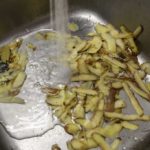 potato peels in a sink