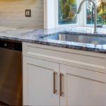 dish washer next to sink