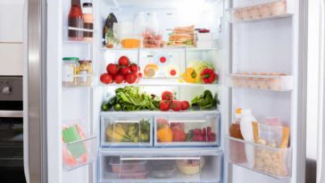Open refrigerator full of food