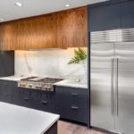 Stainless Steel Appliances in a dark grey themed kitchen