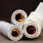 PVC pipe full of calcium deposits and corrosion