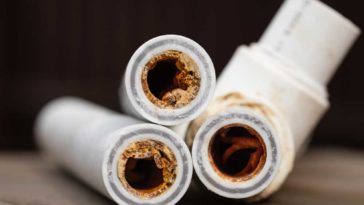 PVC pipe full of calcium deposits and corrosion