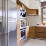 stainless steel side by side fridge in a modern kitchen