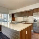 Kitchen with a stainless steel fridge