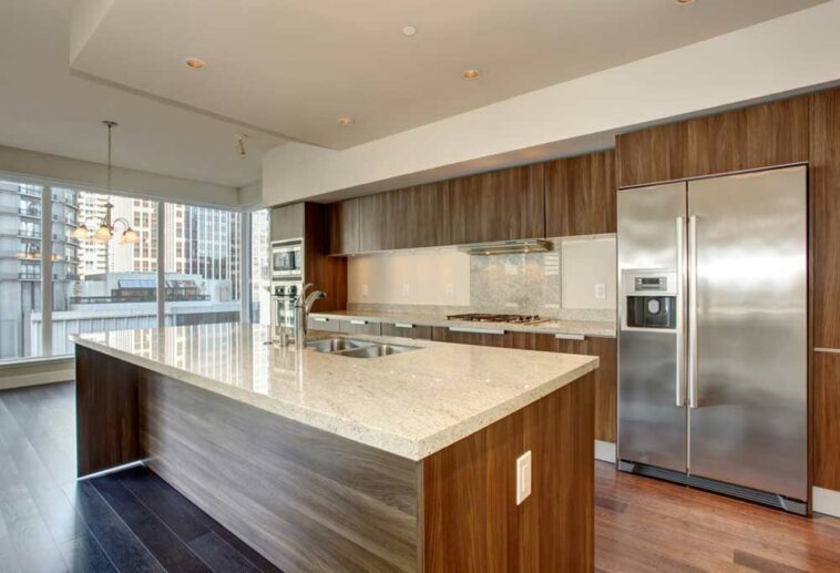 Kitchen with a stainless steel fridge