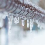 Copper tubing covered in ice