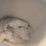 fridge ice dispenser, top view with it filled with ice