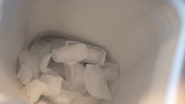 fridge ice dispenser, top view with it filled with ice