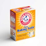 Box of Arm and Hammer Baking Soda on a white background