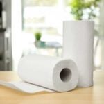 2 rolls of paper towels on a kitchen counter
