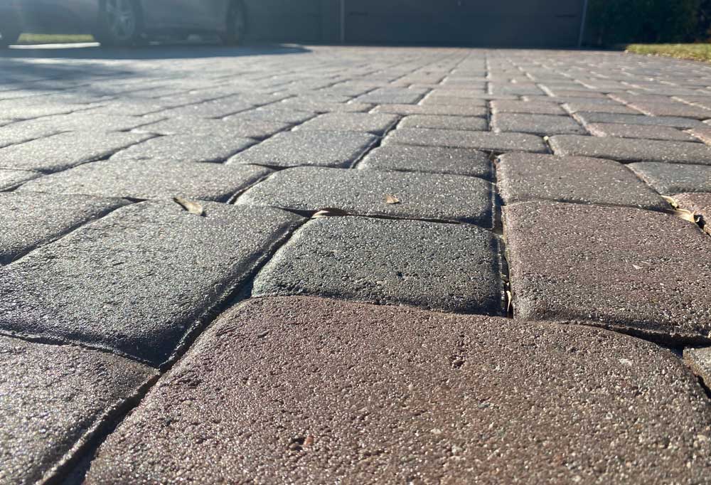 close up of square brick patio pavers