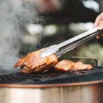 Chicken being cooked on a barbecue grill