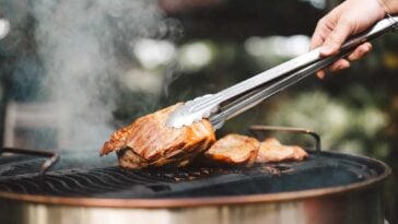 Chicken being cooked on a barbecue grill