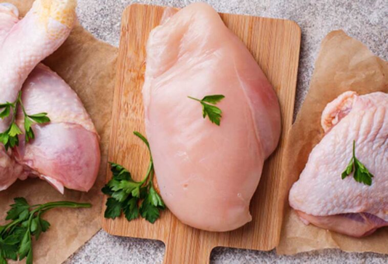 3 cuts of raw chicken on cutting boards