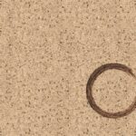 Background of Corian with a circle burn mark in the bottom right corner